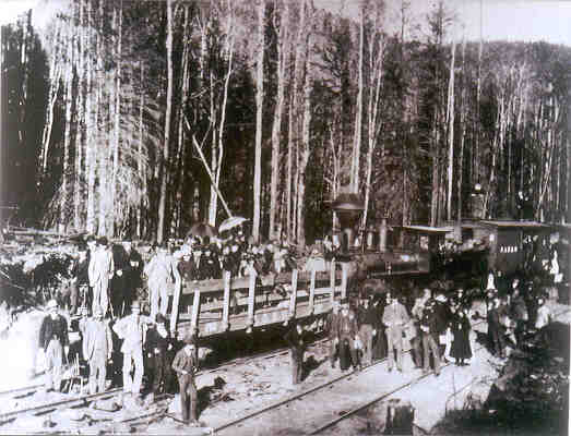 The 2-6-0 Mogul #108 heads up a mixed train of the Canadian Northern Railway at Mackies Siding in 1918.